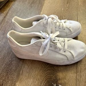 White Nike court shoes